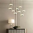 Front view of Harper Console under modern pendant lights, decorated with black bowl and table lamp