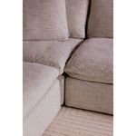 Close-up of clay ottoman fabric texture and cushion seam detail between sectional pieces