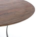Close-up of tabletop edge showing smooth rounded profile and wood texture