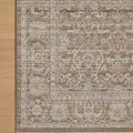 Corner of Ida Bark / Multi rug on light wood floor showing pattern details and muted color variations