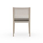 Rear view of Sherwood Brown chair showing taut beige woven backrest strands and charcoal cushion