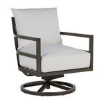 Outdoor swivel rocker chair with slate gray aluminum frame and thick white cushions