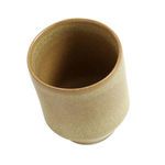 Top-down angled view showing wide opening and smooth inner surface of beige ceramic cup