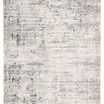 Abstract modern area rug in neutral gray and ivory tones with subtle carved texture and sheen