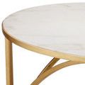 Close-up detail of marble edge and gold frame showing clean inset and smooth finish
