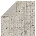 Back folded corner revealing solid 100% cotton fabric backing in light beige