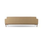 Rear view of Ethel Sofa showing smooth, loose upholstery on fixed back with wood base