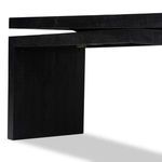 Side view of the leg and bottom support beam beneath the offset tabletop