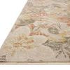 Close-up side view showing thin profile and fringed edge of the botanical floral rug