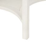 Close-up of Sara end table leg and curved stretcher detail in sailcloth finish