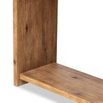 Close-up of lower shelf joining the paneled side, highlighting subtle texture differences