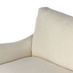 Close-up showing corner stitching and soft cushion texture on backrest