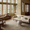 Heritage Aqua Terracotta rug styled in sunlit living room with beige sofa and wooden furniture