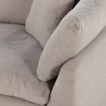 Angle focused on cushion layering and soft upholstery seams