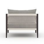 Back view showcasing vertical cotton rope weaving spanning chair frame on Sherwood Faye Ash Bronze