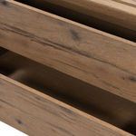 Interior drawer bottom and side wood surface revealing smooth finish and grain pattern