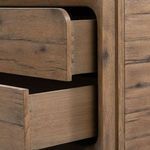 Detailed view of drawer sides showing dovetail joinery and wood finish