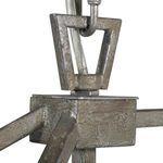 Close-up of antique silver leaf textured metal frame and connecting square metal hub