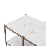 Slim side profile view showing all four marble shelves nested in brass frame