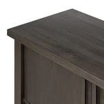 Close-up angled view of the top and side edges highlighting the wood grain and finish