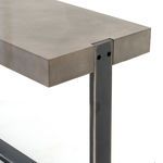 Close-up on rubbed edge and smooth surface of grey concrete top on Mercury Console