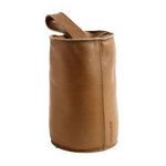 Cylindrical camel-colored Buffalo leather door stopper with a handle and visible stitching