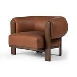 Three-quarter angle showing side armrest and thick cushion profile