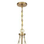 Close-up of chain and brass fixture mounting the Reiling 3-light pendant to ceiling