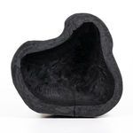 Top view of smaller bowl featuring irregular organic shape with deep carvings