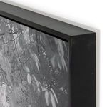 Black maple frame corner close-up showing textured matte finish and precise edges