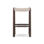Front view focused on two rounded horizontal footrest bars between dark stained wood legs