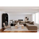 Verlaine chair within contemporary living room setup featuring sectional sofa, coffee table, and window light