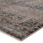 Diagonal close-up of Elio Oriental Gray Black rug focusing on woven fibers and subtle color variations