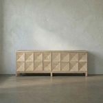 Extra-large four-door sideboard with geometric patterned doors in warm washed walnut finish on raised legs