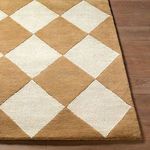 Detailed corner view highlighting the wool texture and sharp diamond pattern edge on hardwood flooring