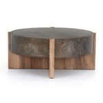 Alternate angled view of drum coffee table with wood legs visible