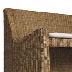 Close-up detail of cushion side seam and thick rattan weave beneath it