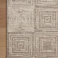 Close-up of Darby Rug corner on hardwood floor showing detailed geometric ribbed texture