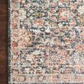 Corner view placed on wood floor showing color contrast and border stitching details