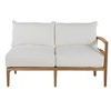 Front view of teak right arm facing sofa with plush white cushions