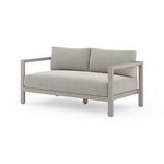 Sonoma 60-inch modern outdoor sofa with solid teak frame and neutral textured cushions
