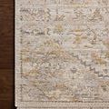 Close-up of corner edge with detailed vintage pattern and beige ochre color accents on Milena rug