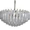 Three-quarter view emphasizing tiered layout and faceted texture of milk glass prisms