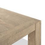 Close-up corner detail from underside highlighting joinery and thick veneer edges