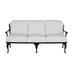 Front view of white cushioned sofa with black aluminum frame and decorative legs