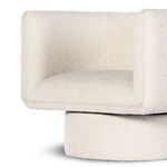 Angled close-up of Adriel chair showing seat cushion depth and upholstery material details