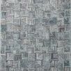 Prescott Arctic Blue Rug with tone-on-tone geometric square patterns in varying blue shades and textured high-low pile