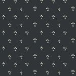 Deep soot black wallpaper with small cream fleur-de-lis pattern and subtle textured surface