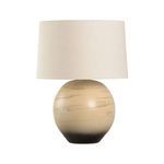 Moriko Lamp shown at a slight right angle highlighting the rounded shape and textured sandy clay base