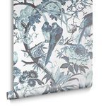 Partial roll of Perrow Wallpaper displaying elaborate bird and floral pattern in blue tones